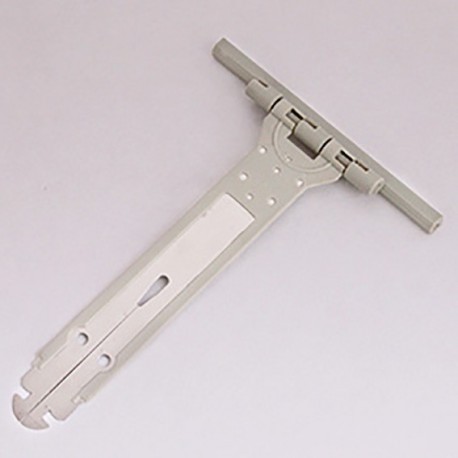 Attache tablier souple fendue à clipser pour volet roulant